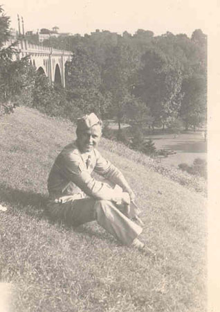 man in cap on lawn