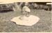woman on grass wtih dress on